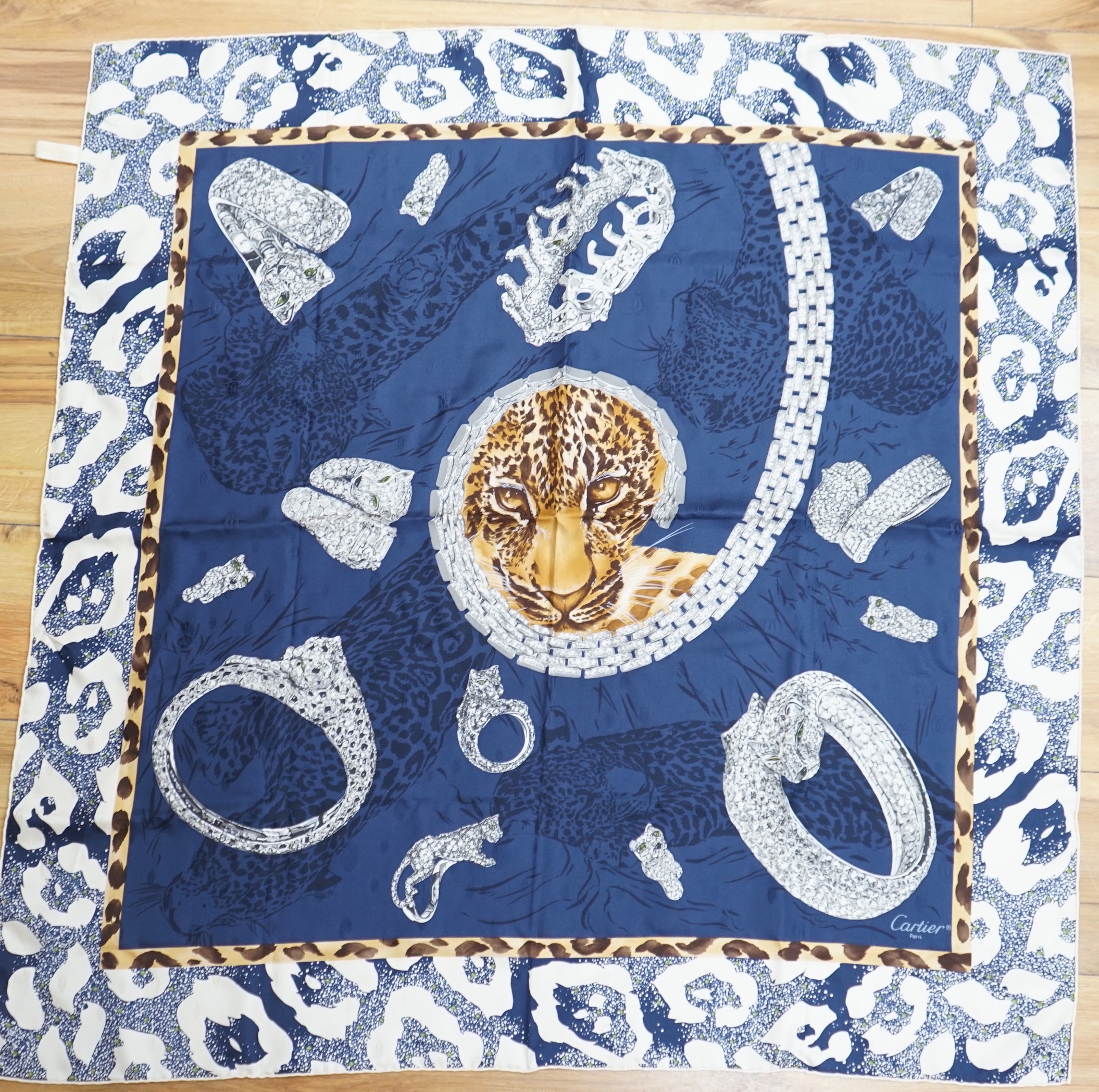 A Cartier silk scarf with Leopard motif